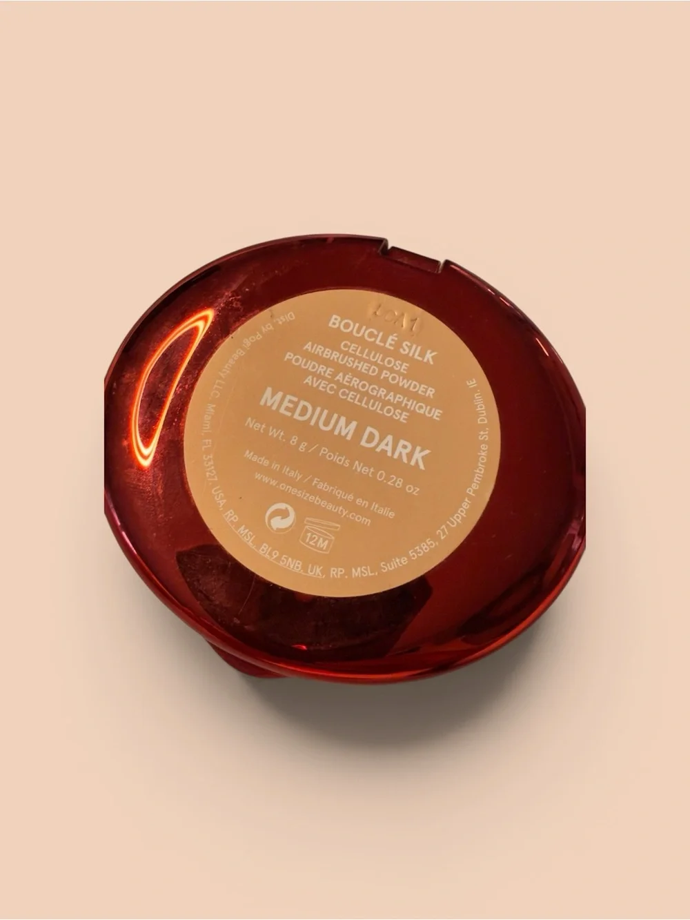 One size bouquet, silk airbrushed powder in the shade medium dark.